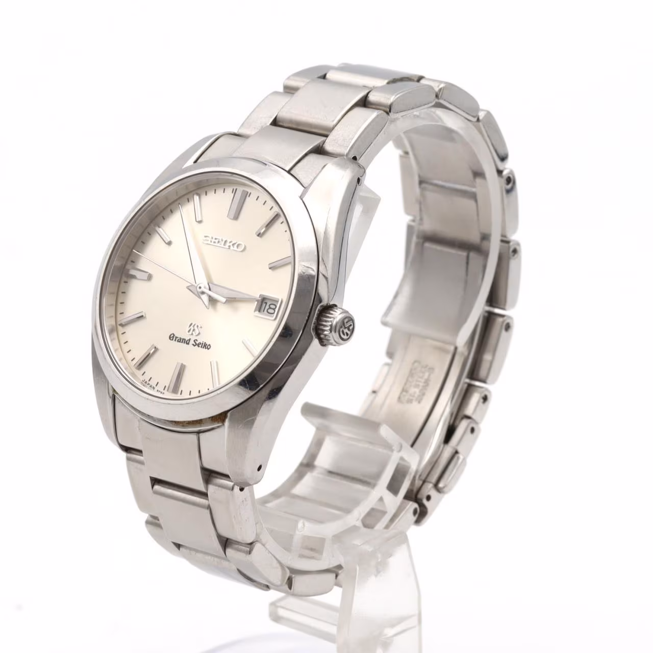 Stainless steel wristwatch with a light dial, baton markers and a matching steel bracelet.