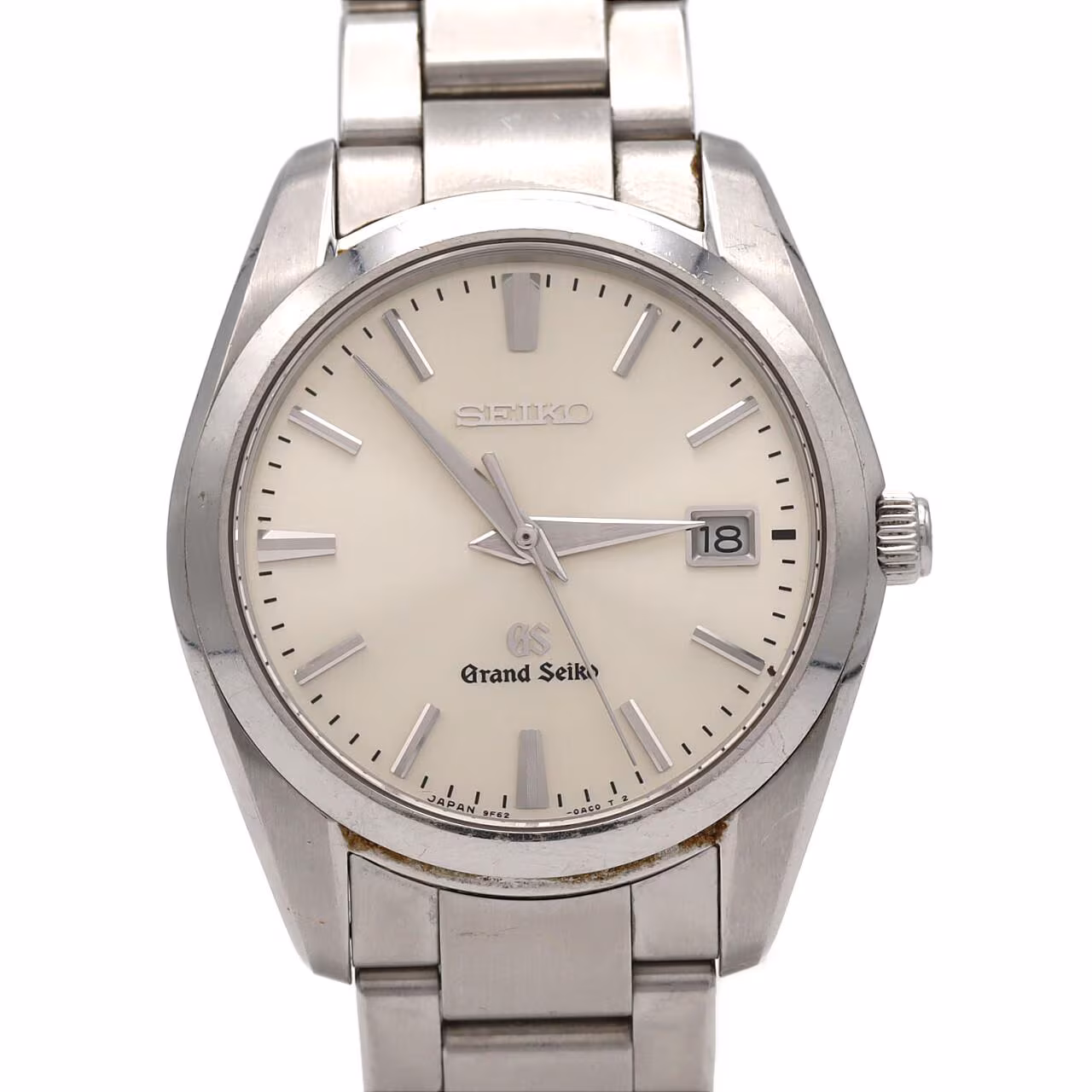 Stainless steel wristwatch with a light dial, baton markers and a matching steel bracelet.