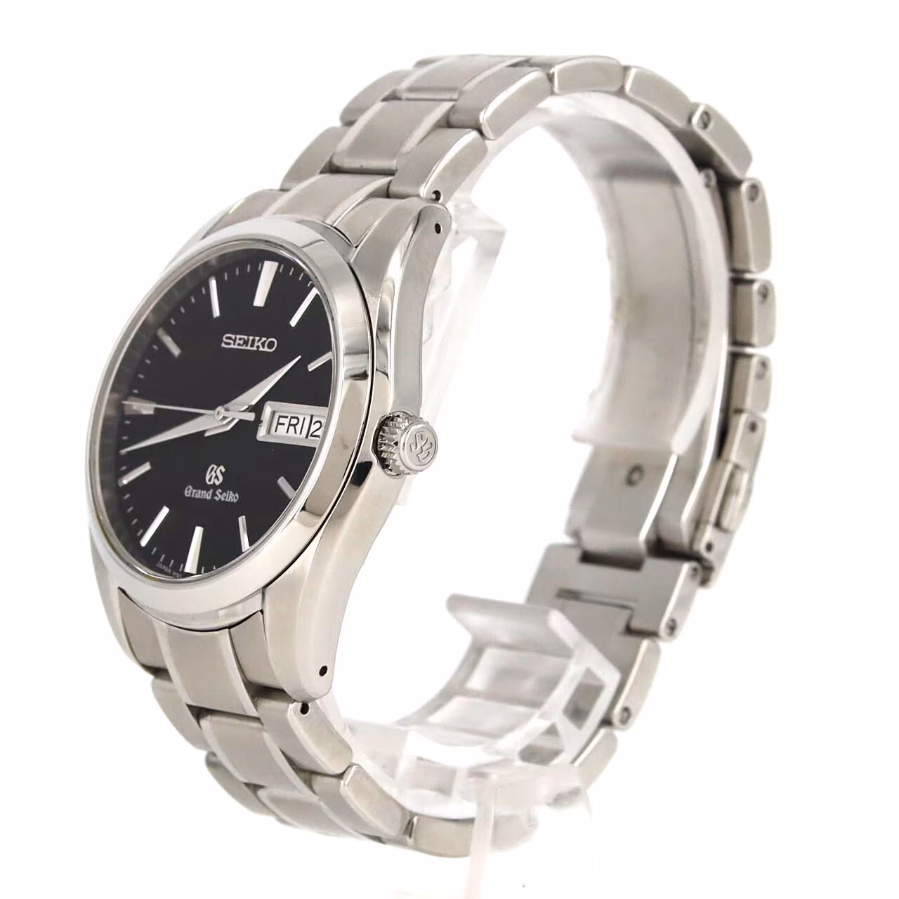 Round polished steel watch on a matching steel bracelet with a light dial and date window.