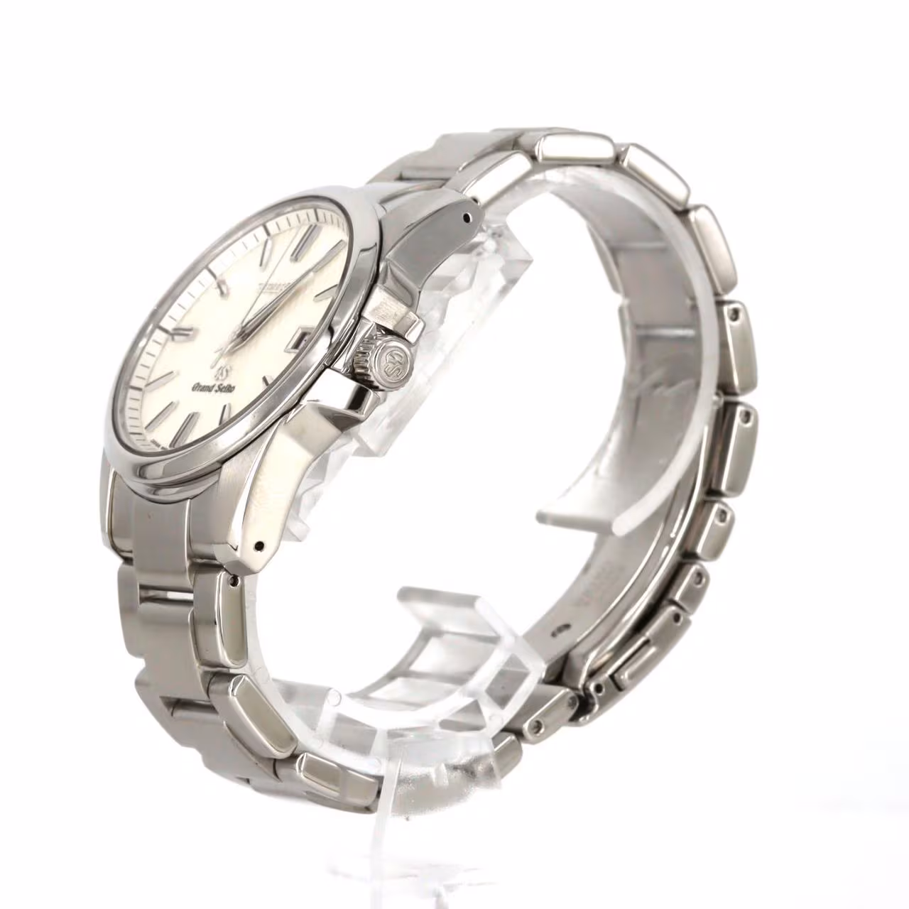 Stainless steel wristwatch with polished case, simple dial and steel bracelet.