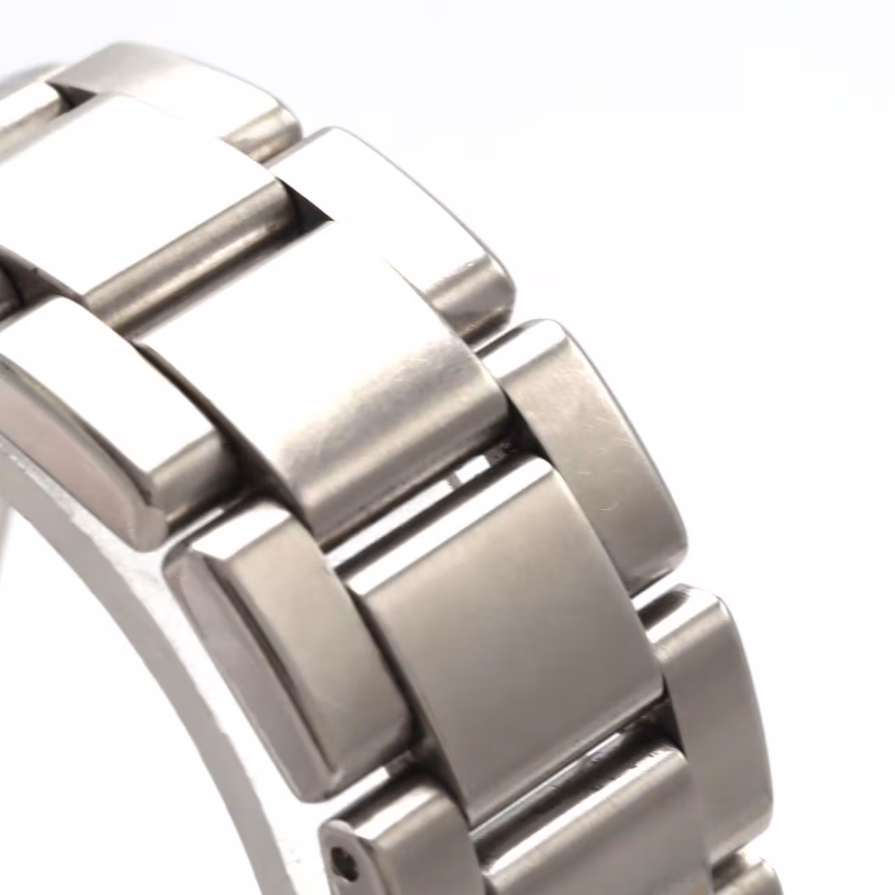 Stainless steel wristwatch with a light dial and integrated steel bracelet.