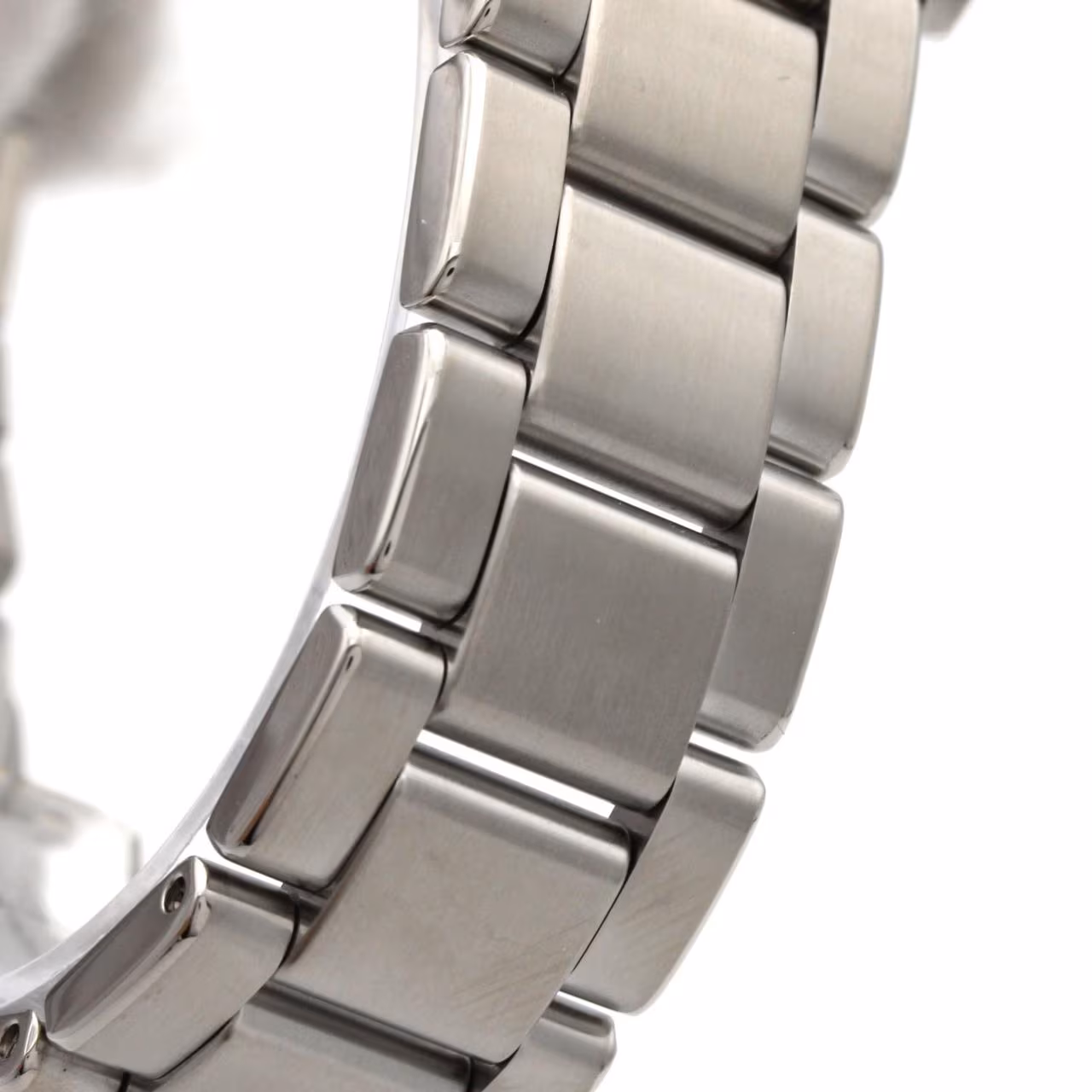 Stainless steel wristwatch with a silver dial, date aperture and a polished steel bracelet.