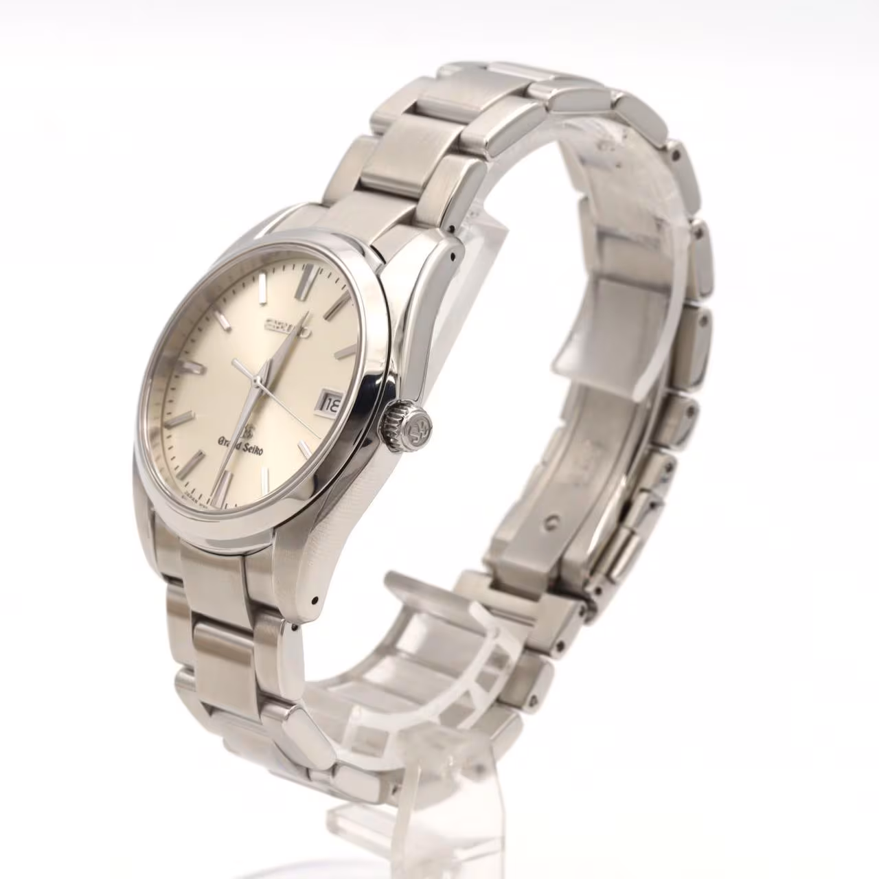 Stainless steel quartz wristwatch with a silver dial, baton markers, date window and steel bracelet.
