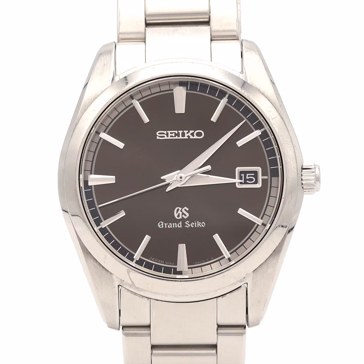 Stainless steel quartz wristwatch with a pale dial and steel bracelet.