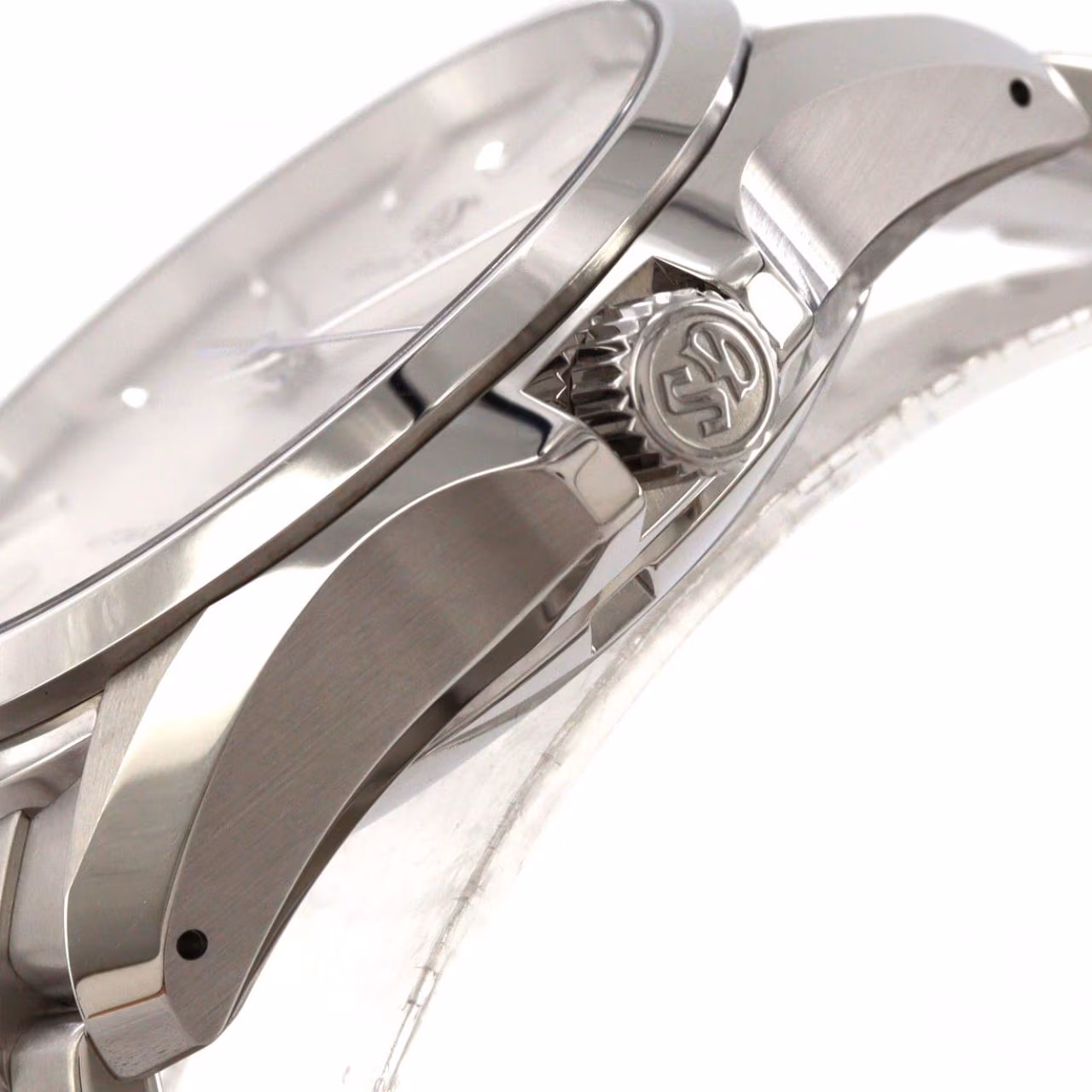 Steel automatic wristwatch with matching bracelet and a date window.