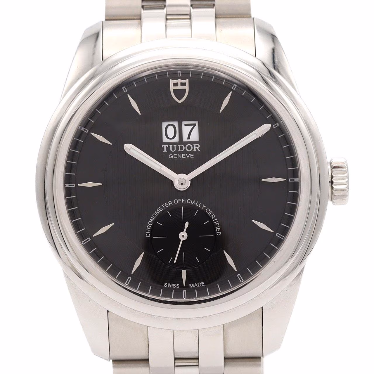 Steel watch with day and date apertures on the dial and a matching steel bracelet.