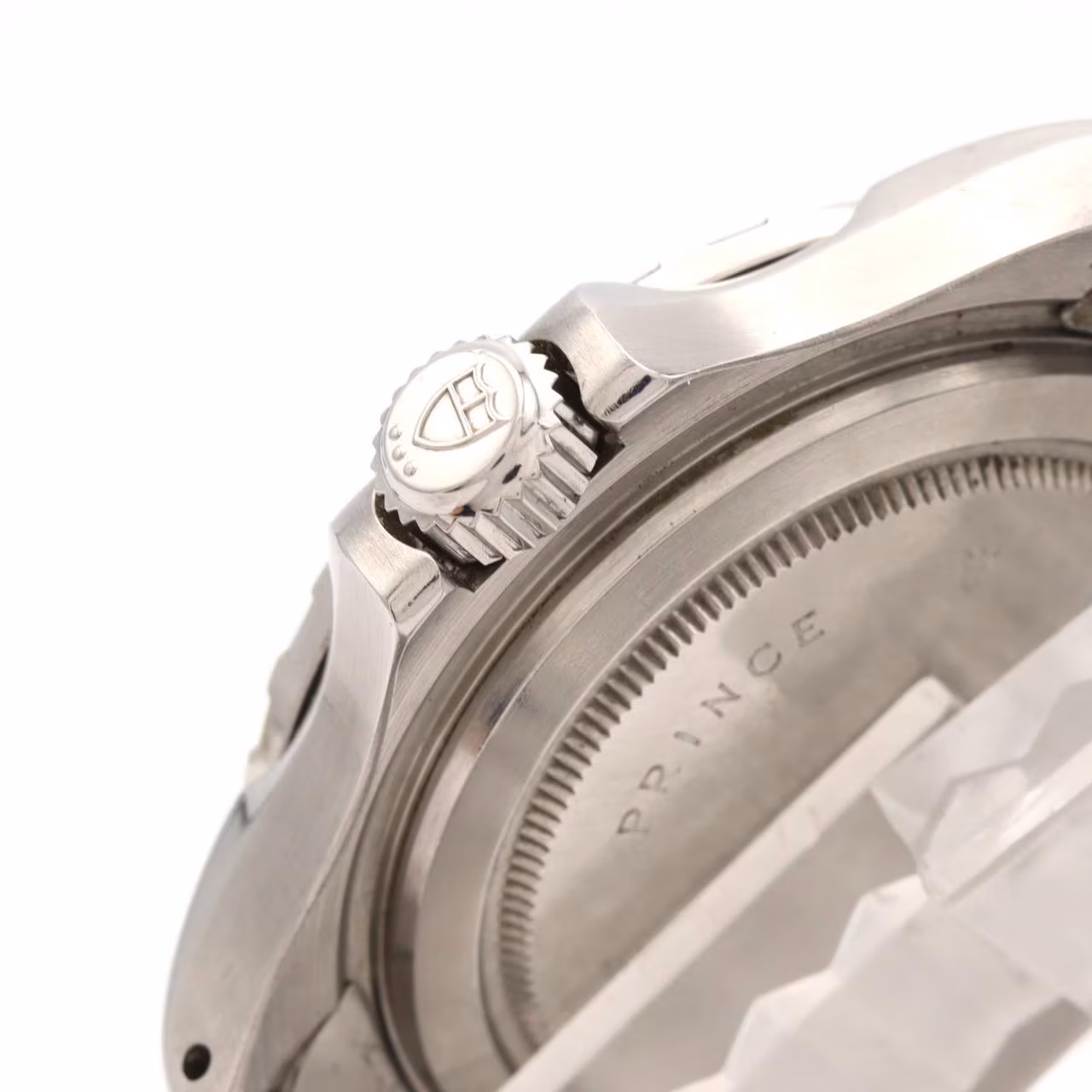 Stainless steel diver-style wristwatch with blue dial and bezel on a steel bracelet.