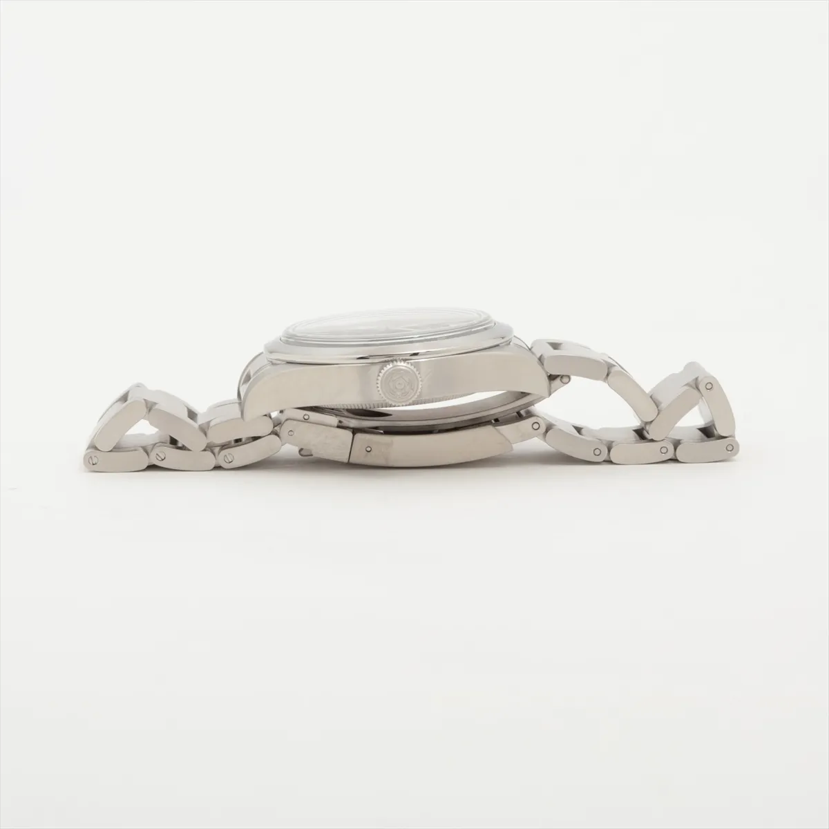 Steel automatic watch with a black dial, luminous numerals and central seconds hand.