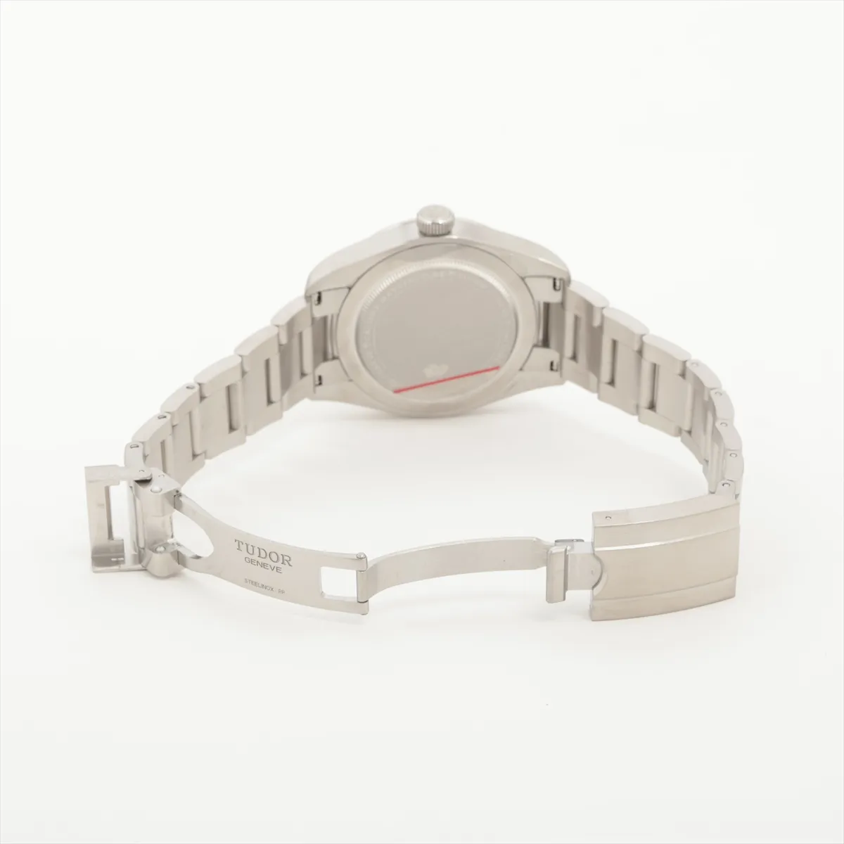 Steel automatic watch with a black dial, luminous numerals and central seconds hand.